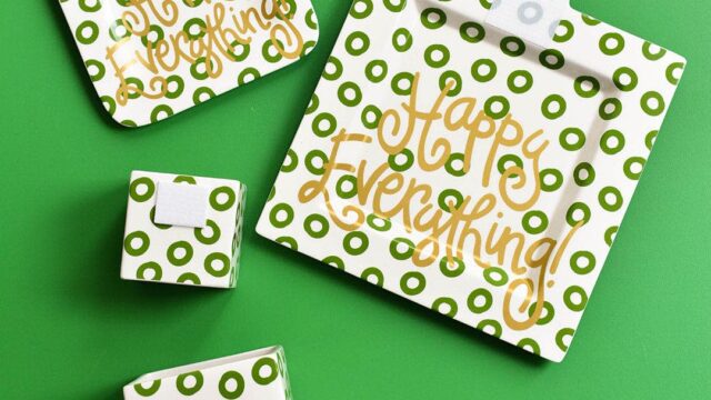 A selection of dishes with a green circle background that read "Happy Everything"